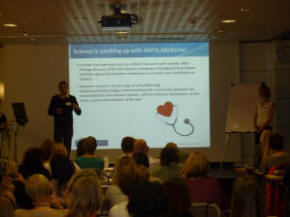 Picture of Robert and Joanne Ross delivering at the International META-Medicine Conference
